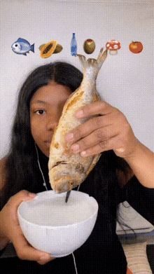 girl-eating-fish-fish.gif